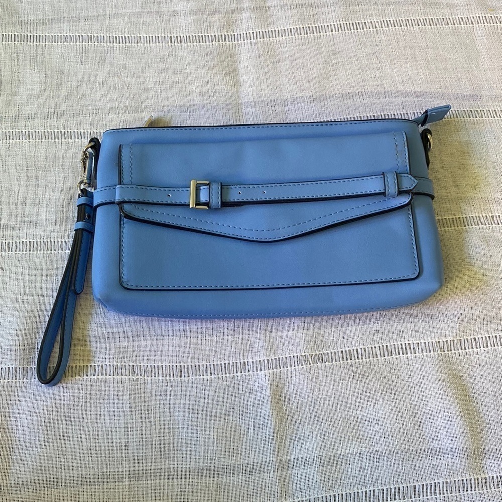 NWOT Reed sky blue wristlet with belt embellishment.